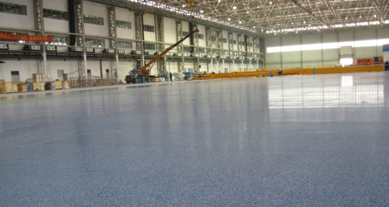 新利平台官网承接沈陽沈飛工業(ye) 集團有限公司總裝廠房環氧彩砂地麵工程
