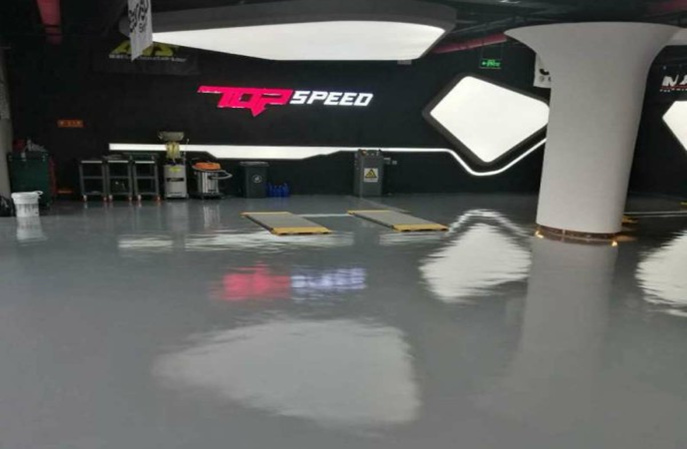 汽修廠水泥自流平地麵使用塑立得翻新